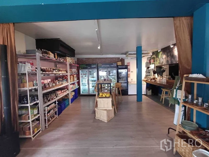 Retail Space for rent in Watthana, Bangkok - Retail zone with product shelves and multiple glass-door refrigerators.