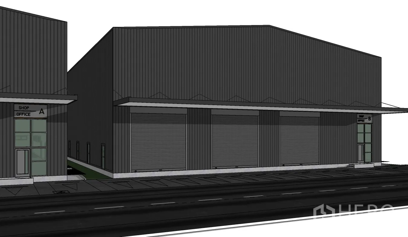 Warehouse for rent in Prawet, Bangkok - Front elevation of the warehouse with several roller shutter bays and shop office entrances.