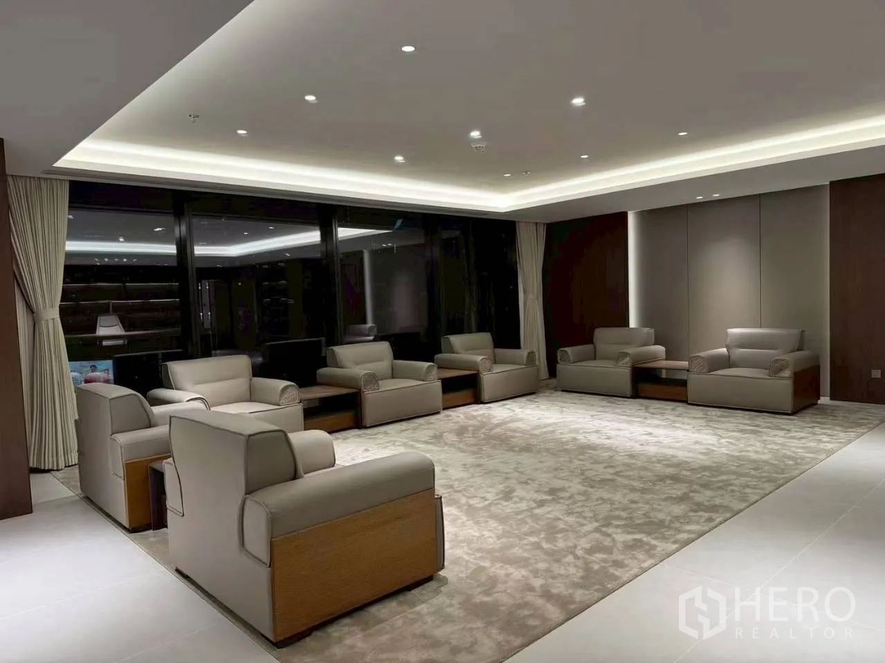 Office Space for rent in Din Daeng, Bangkok - Alternate view of the expansive lounge area with matching armchairs and soft ceiling lighting.