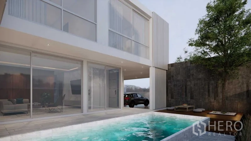 Land for sale in Prawet, Bangkok - Courtyard render showing a compact swimming pool beside full‑height sliding glass doors and deck seating.