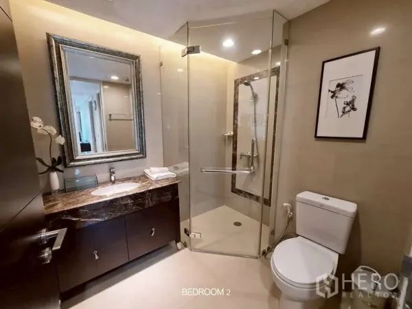 Retail Space for rent in Watthana, Bangkok - Modern bathroom with glass shower, marble vanity, and toilet