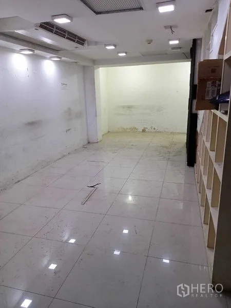 Retail Space for rent in Watthana, Bangkok - View of the lower level showing display shelving, spotlights and an open, clean floor plate.