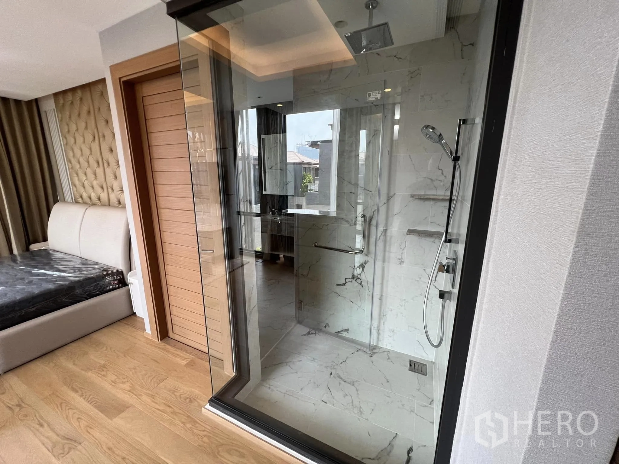 Detached House for rent or sale in Yan Nawa, Bangkok - Close-up of glass shower enclosure with rain shower.