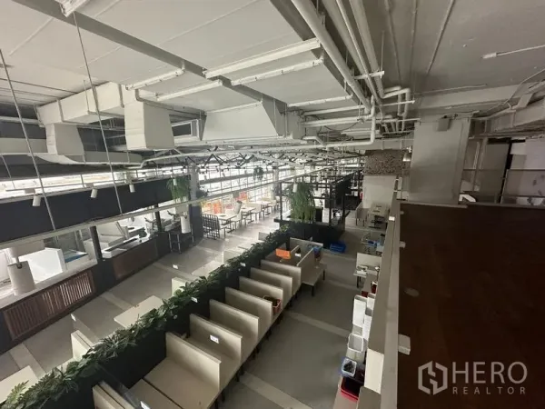 Retail Space for rent in Watthana, Bangkok - Overhead view from mezzanine of open-plan food hall with counters and seating.