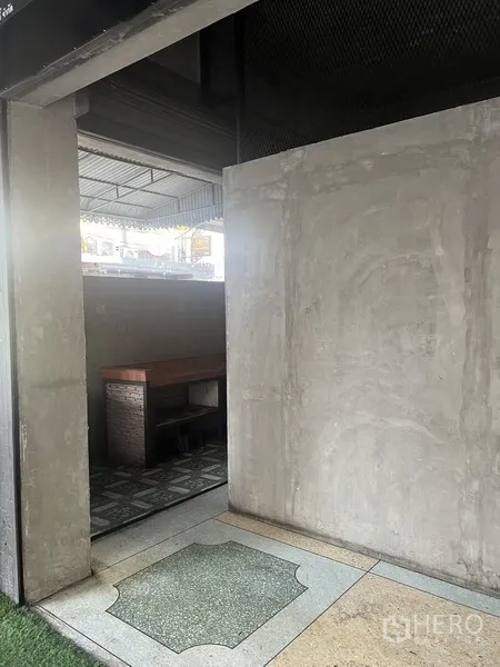 Retail Space for rent in Watthana, Bangkok - Sliding doorway into a service room with terrazzo flooring.
