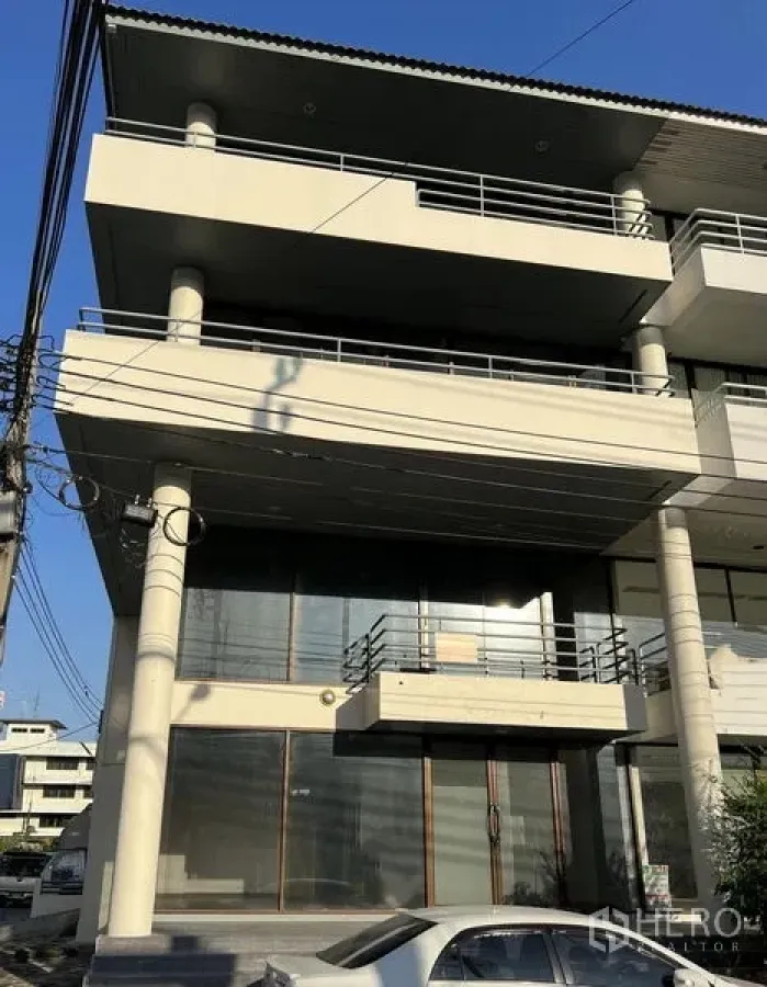 Office Space for rent or sale in Suan Luang, Bangkok - Multi-storey commercial building with wide balconies and ground-floor glass frontage in Suan Luang, Bangkok.