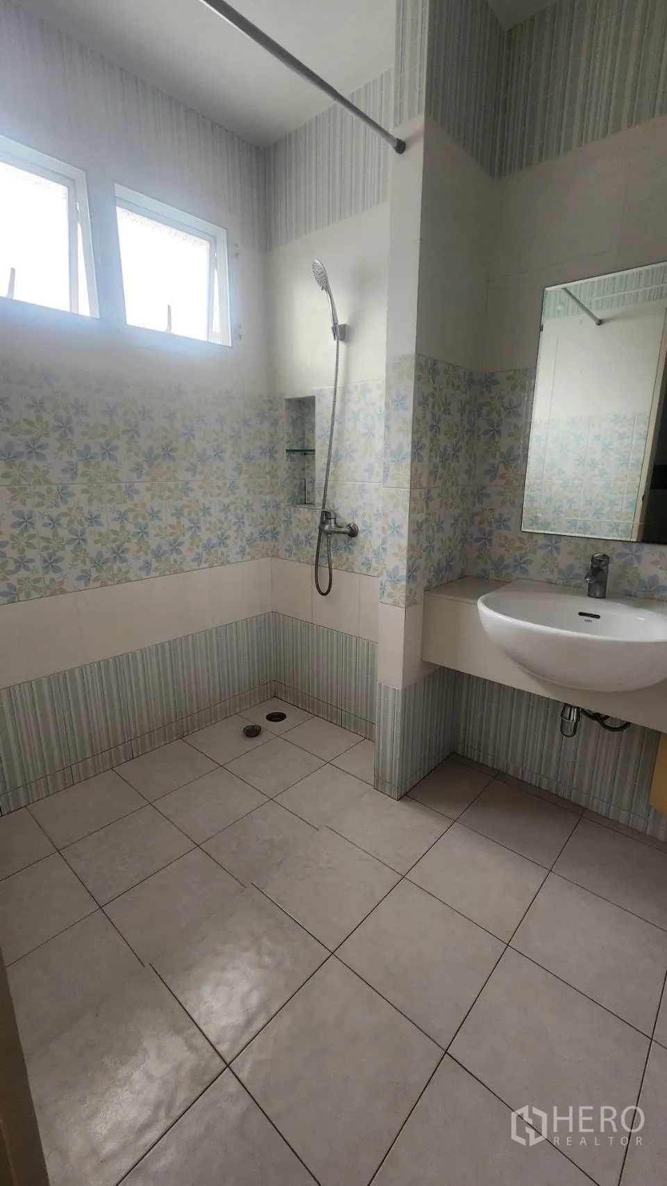 Detached House for rent in Watthana, Bangkok - Walk-in shower area with vanity and twin windows.