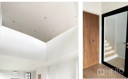 Home Office for rent in Don Mueang, Bangkok - High ceiling detail and stairwell with a black-framed glass door.