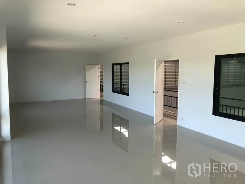 Factory for rent or sale in Bang Bo, Samut Prakan - Open-plan second-floor office area with doors to meeting rooms.