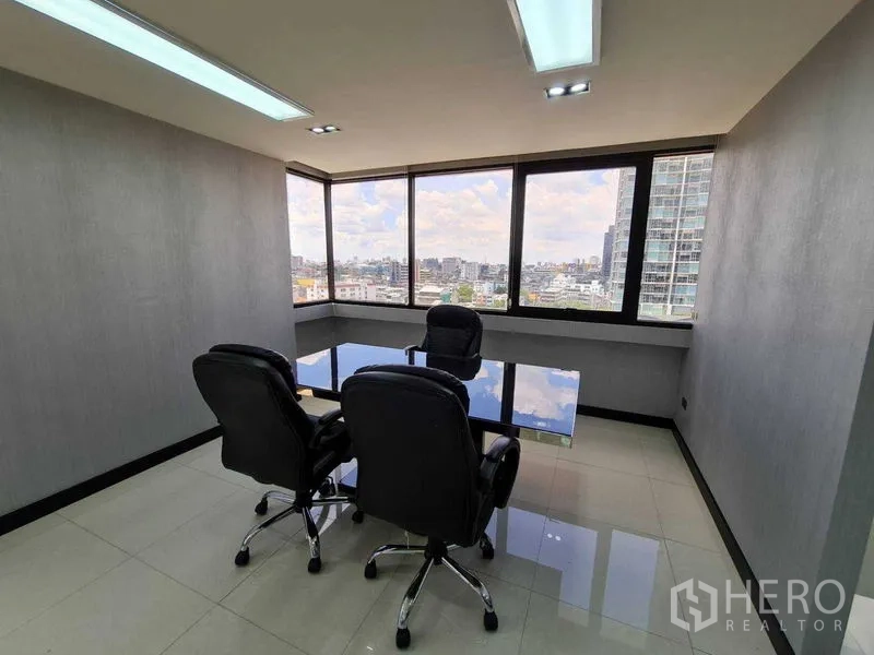Office Space for rent - Private meeting room with panoramic corner windows overlooking the Bangkok skyline.
