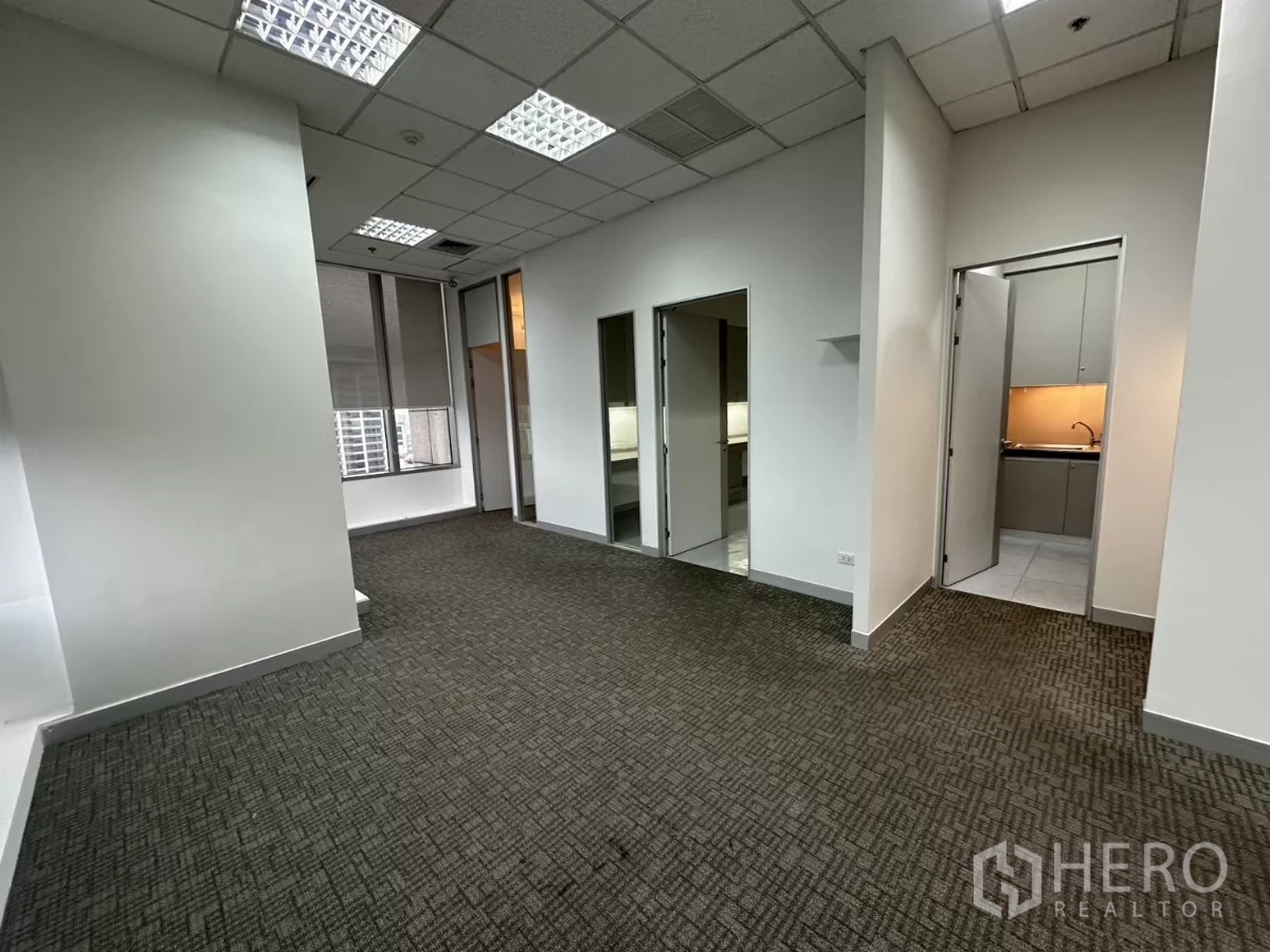 Office Space for rent in Watthana, Bangkok - Flexible workspace with doors to a meeting room and pantry, plus large windows.