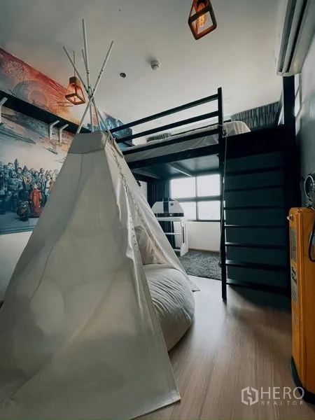 Condominium for rent in Suan Luang, Bangkok - Kid-friendly bedroom with loft bed, teepee tent, and bright window light