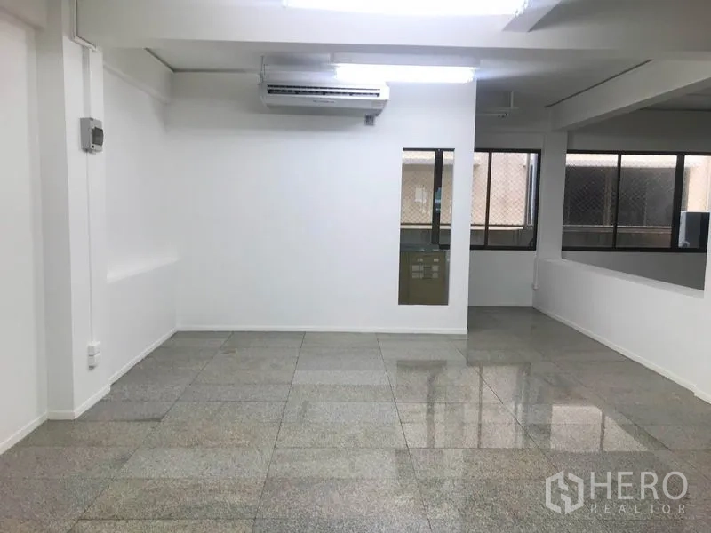 Office Space for rent in Suan Luang, Bangkok - Private office room with air conditioning, windows, and tiled floor.