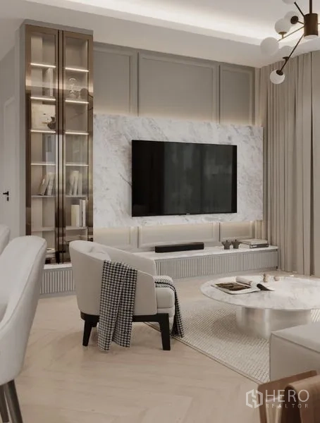 Detached House for rent in Bang Phli, Samut Prakan - Living room corner with marble feature wall, large TV and glass display cabinet.