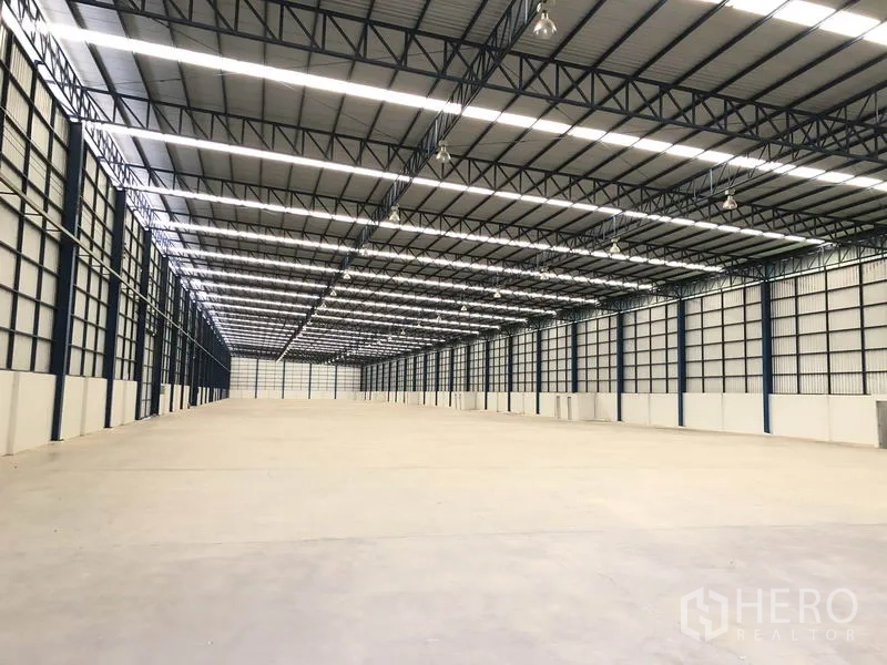 Factory for rent or sale in Phra Nakhon Si Ayutthaya - Deep warehouse hall providing expansive manufacturing and storage space.