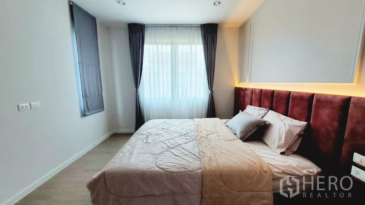 Detached House for rent in Lat Krabang, Bangkok - Master bedroom from another angle with large window and backlit headboard.