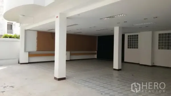 Office Space for rent in Sathon, Bangkok - Spacious open workspace with support columns, drop-ceiling lighting, and tiled flooring.