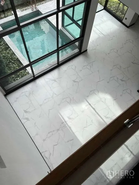 Detached House for sale in Bang Kruai, Nonthaburi - View from mezzanine to double-height foyer and private pool outside.