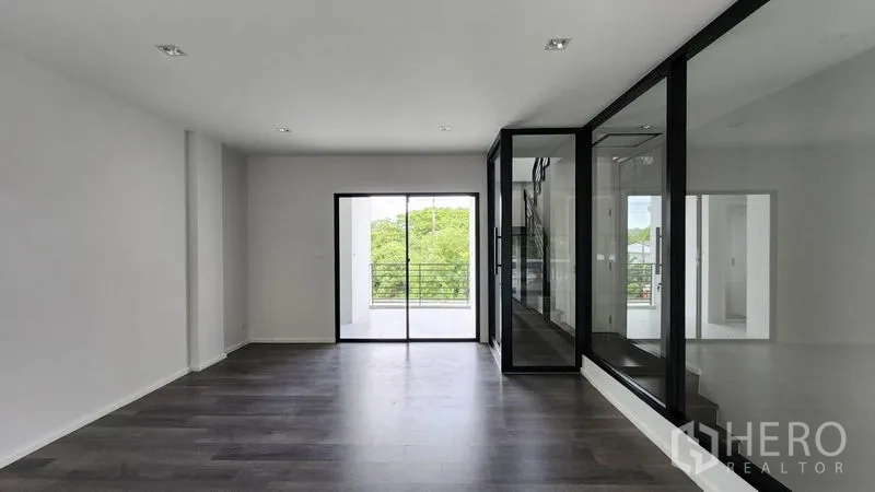 Home Office for rent - Spacious open-plan level with sliding doors to a balcony and internal glass office.