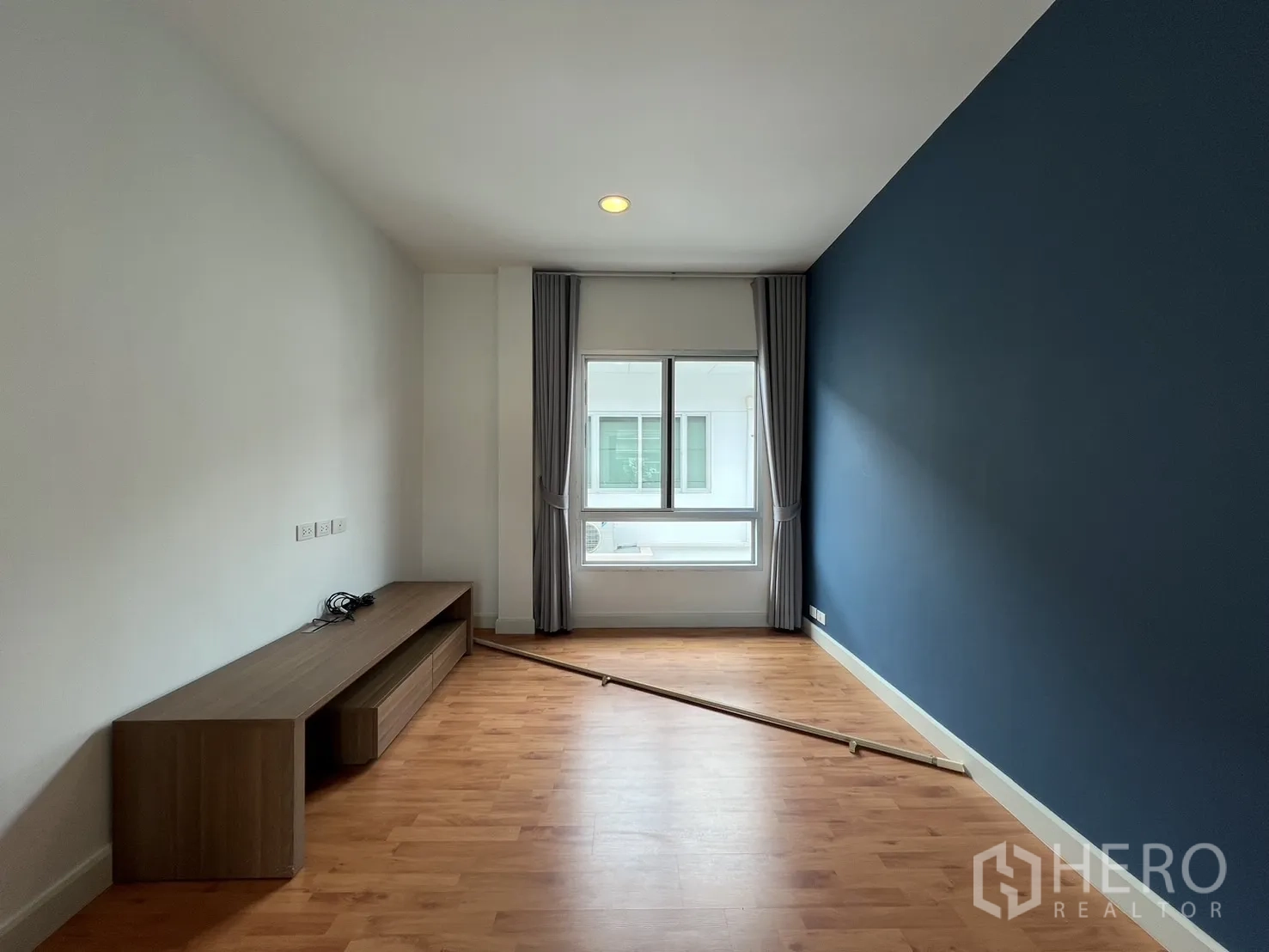 Detached House for rent in Saphan Sung, Bangkok - Master bedroom view toward large wardrobes and corner windows.