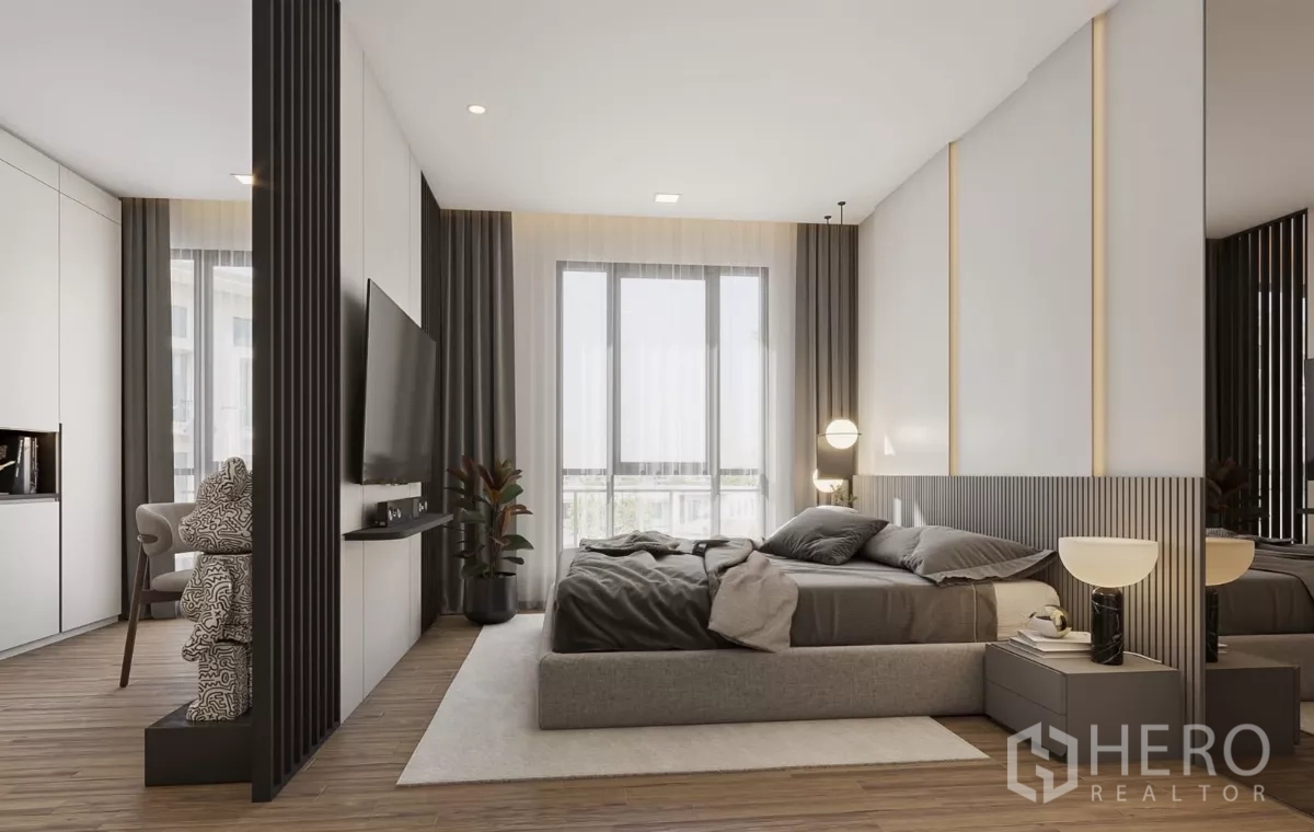 Townhouse for rent in Chatuchak, Bangkok - Primary bedroom with feature wall, large windows and soft lighting.