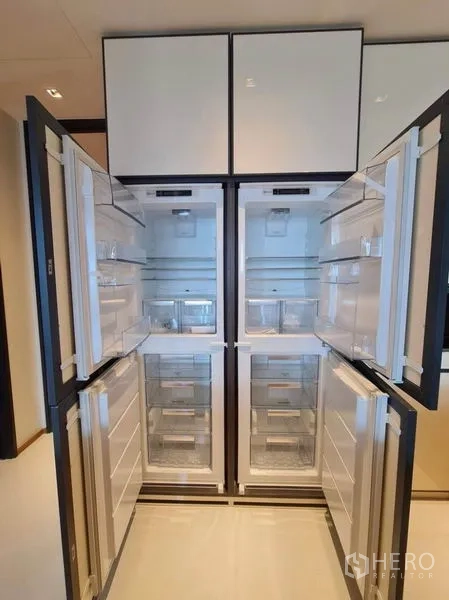 Condominium for rent in Khlong Toei, Bangkok - Built-in double refrigerators with doors open showing spacious storage.