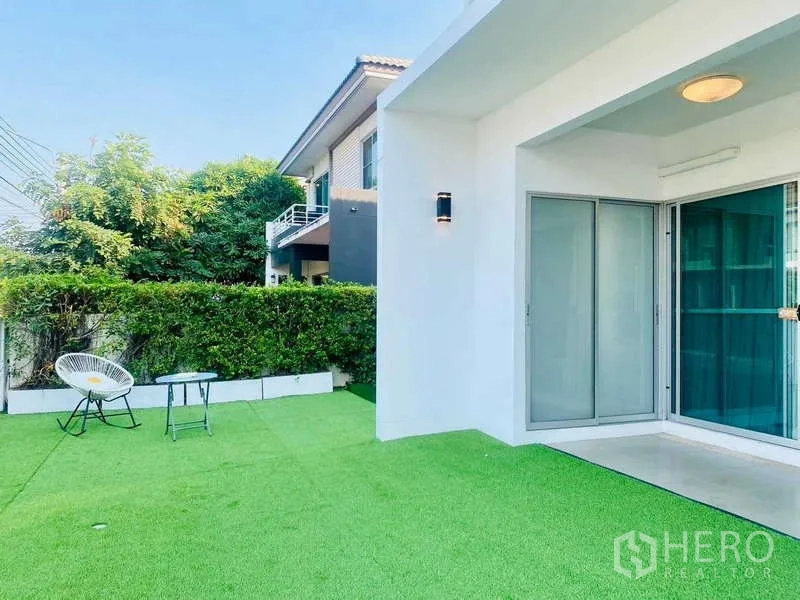 Detached House for rent or sale - Back patio with artificial turf and sliding glass doors.