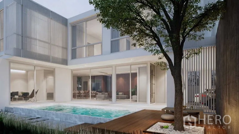 Land for sale in Prawet, Bangkok - Courtyard render featuring a tree, wooden deck and a lap pool next to bright living areas.