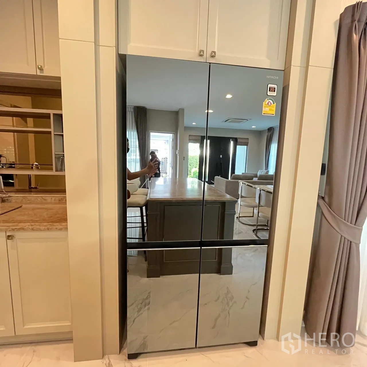 Detached House for rent or sale in Bang Khen, Bangkok - Sleek double‑door refrigerator set in custom cabinetry.