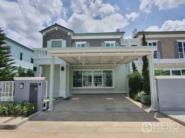 Townhouse for rent - Another angle of the townhouse facade highlighting the covered parking.