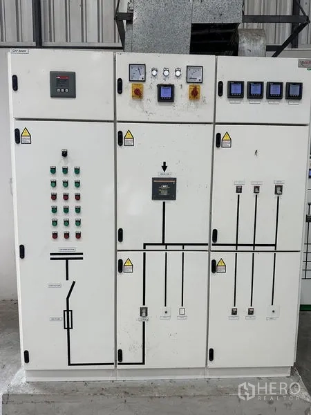 Warehouse for rent in Lat Krabang, Bangkok - Electrical switchboard and control panel providing three-phase power inside the warehouse.