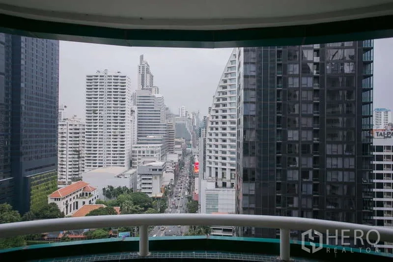 Condominium for rent or sale in Watthana, Bangkok - Covered balcony facing the Asoke skyline and Sukhumvit Road.