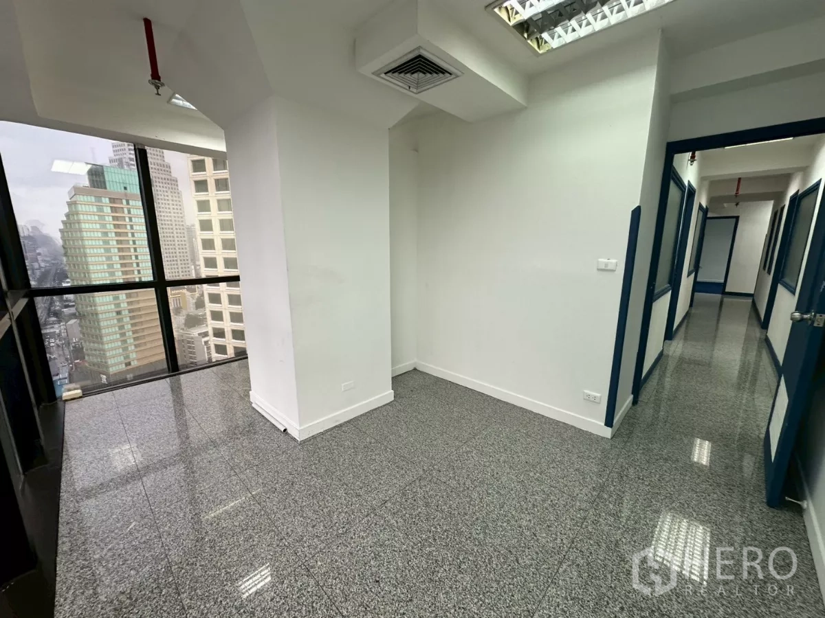 Office Space for rent in Khlong Toei, Bangkok - Reception or waiting area with granite flooring and skyline outlook.