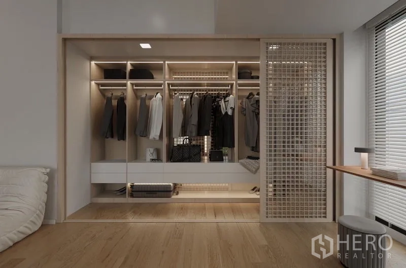 Detached House for rent in Saphan Sung, Bangkok - Open wardrobe with illuminated compartments and a sliding lattice door.