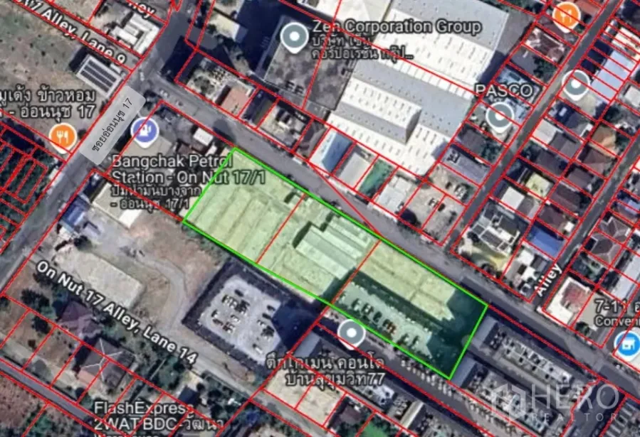 Land for sale - Satellite map highlighting a large rectangular land plot outlined in green in Suan Luang, Bangkok, near the On Nut BTS area with surrounding roads and buildings.