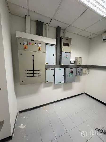 Standalone for rent in Khlong Toei, Bangkok - Electrical control room with power distribution panels.