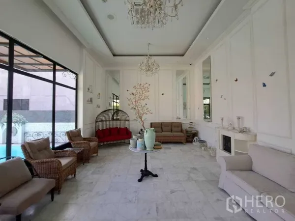 Retail Space for rent in Watthana, Bangkok - Elegant retail lounge with chandeliers, sofas and large windows beside the pool.