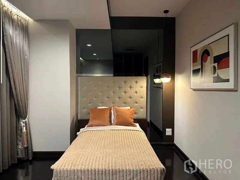 Detached House for rent - Guest bedroom with single bed, tufted headboard, pendant light and modern art.