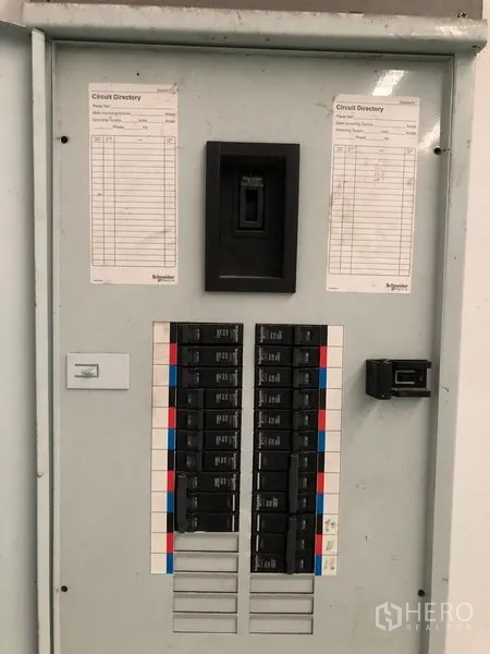 Factory for rent in Samut Prakan - Electrical distribution panel with labeled breakers for three‑phase power.