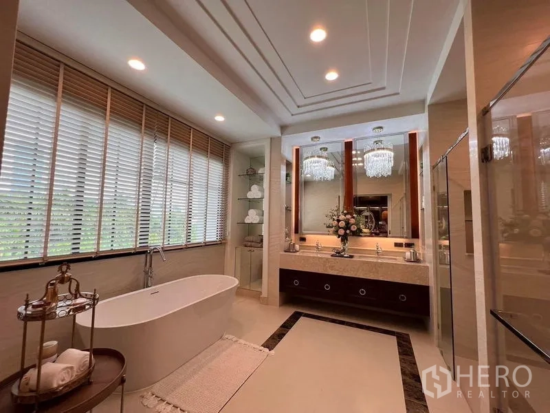 Detached House for sale in Yan Nawa, Bangkok - Luxury bathroom with freestanding tub, double vanity and glass shower enclosure.