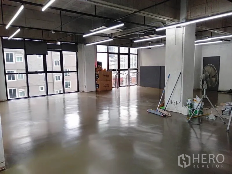 Office Space for rent in Khlong Toei, Bangkok - Bright open-plan office with polished concrete floor, large windows and linear LED lighting in Phrom Phong, Bangkok