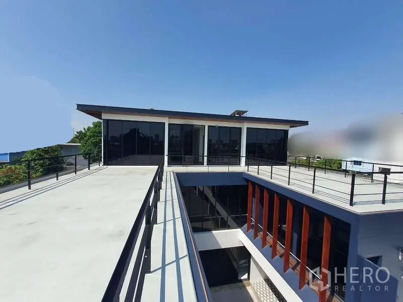 Detached House for rent in Phra Khanong, Bangkok - Expansive rooftop terrace and skybridge connected to a glass-walled pavilion.