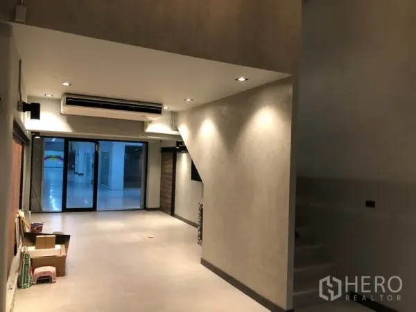 Retail Space for rent in Watthana, Bangkok - Open-plan ground floor retail area with recessed lighting, air-conditioning and front glass doors.