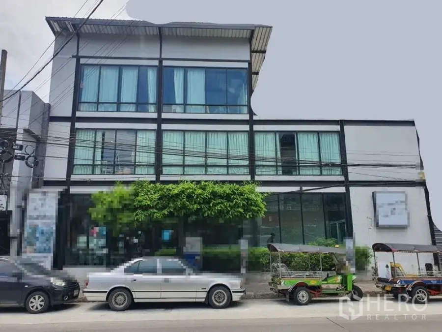 Retail Space for rent in Sathon, Bangkok - Modern three-storey commercial building with large glass frontage and street parking in Sathon.