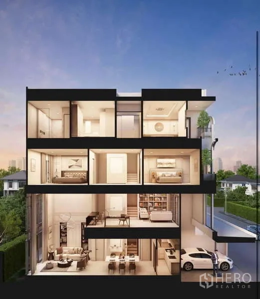 Townhouse for sale - Cross-section view of a multi-level townhouse showing double-height living room, dining area, bedrooms, balcony and ground-floor garage.