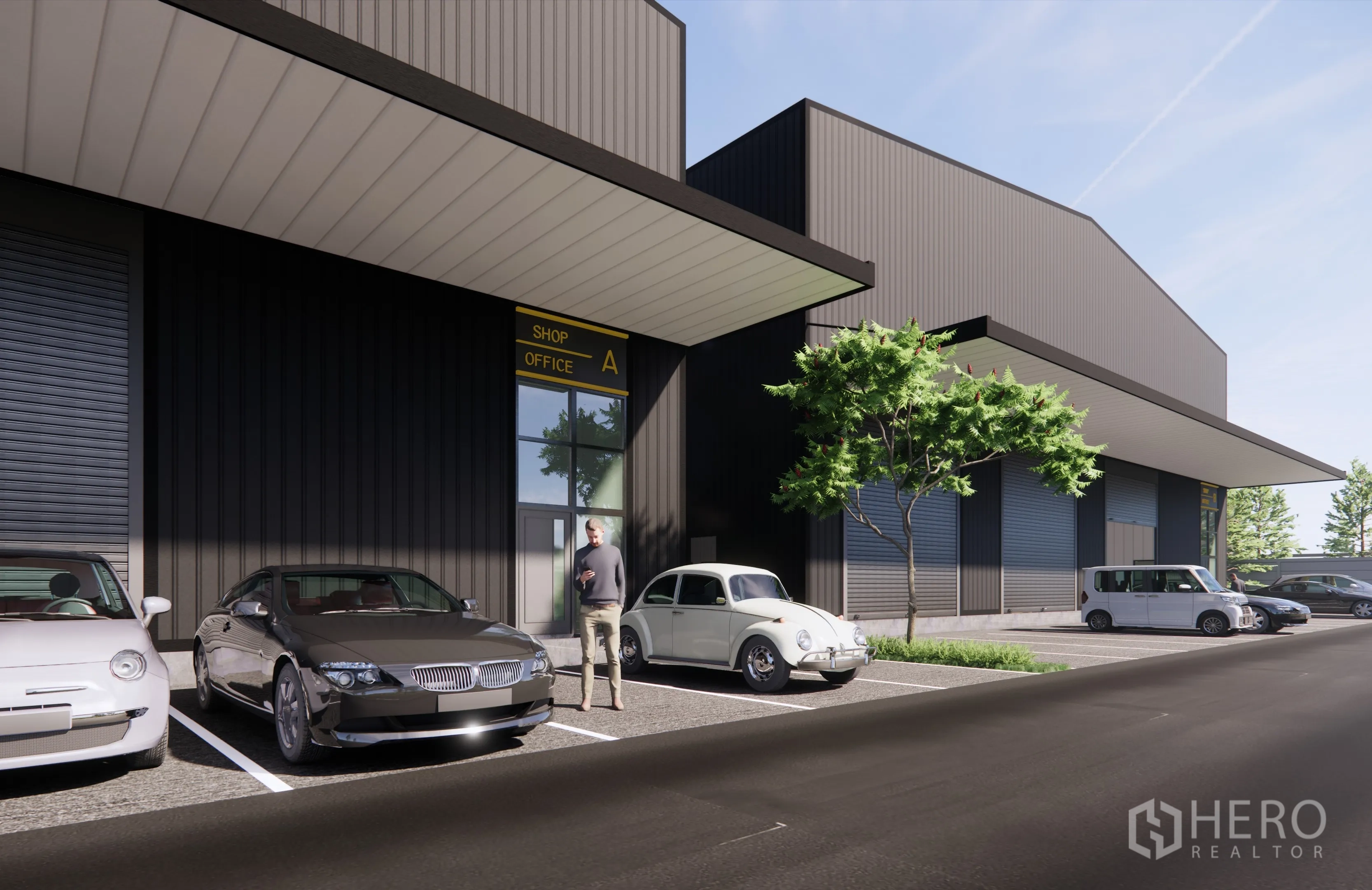 Warehouse for rent in Prawet, Bangkok - Close view of the shop office entry and marked parking spaces beneath a wide loading canopy.