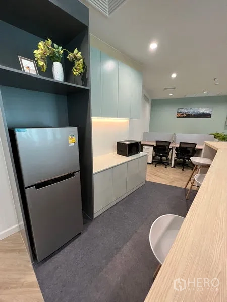 Office Space for rent - Pantry area with fridge, microwave, built-in cabinets and breakfast bar.