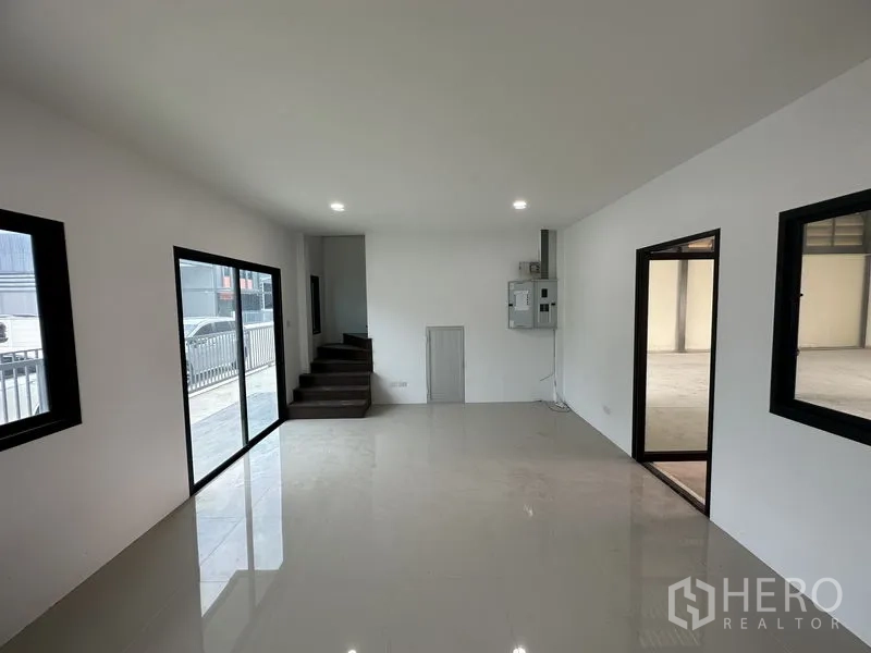 Factory for rent or sale in Bang Yai, Nonthaburi - Bright second office room with ensuite restroom and wide windows.