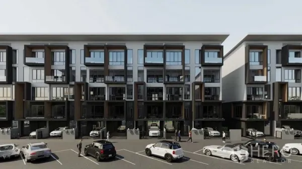 Home Office for rent - Row of contemporary home office buildings with glass fronts and a parking area filled with cars.