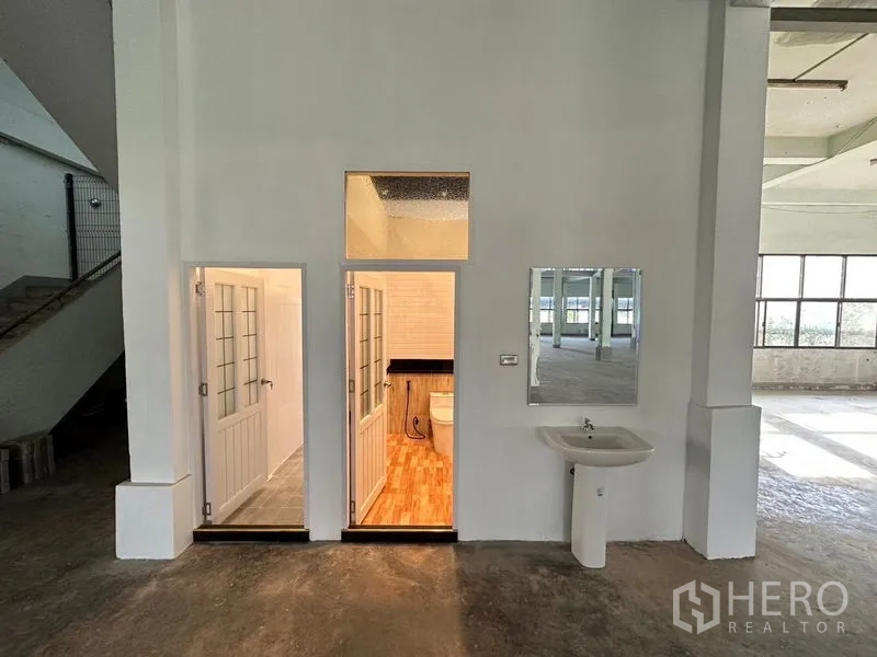 Office Space for rent in Bang Sao Thong, Samut Prakan - Restroom block built inside the main hall with external handwash basin.